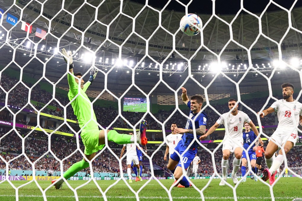 Christian Pulisic scores his side’s winner against Iran’s Photo: Reuters