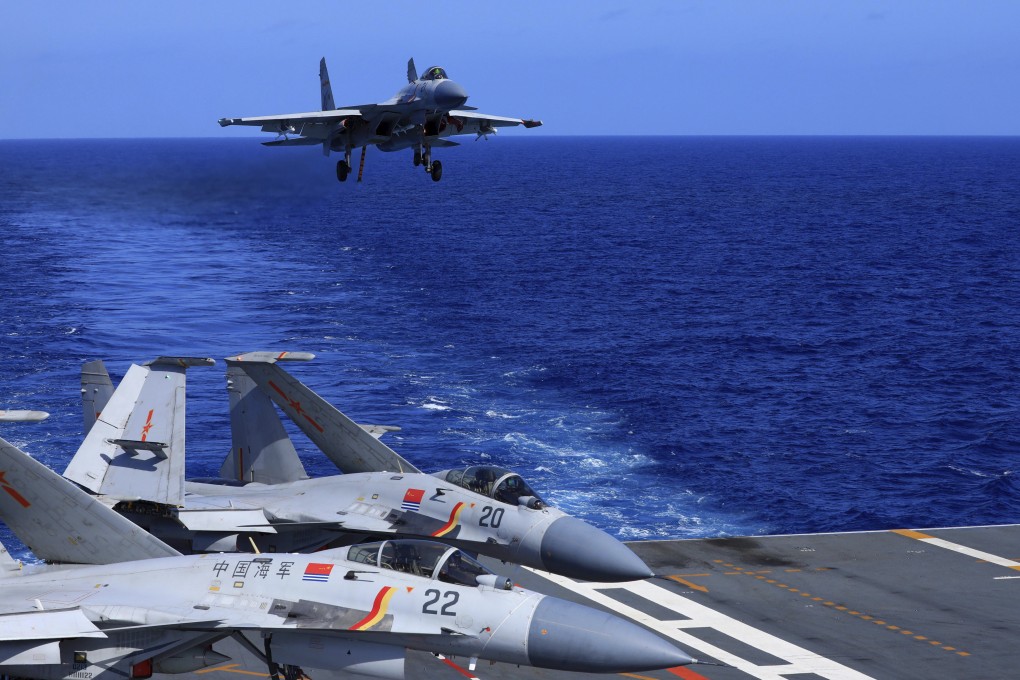 China’s J-15 features advanced flight control and radar systems, a pair of additional small front wings and other modifications allowing it to make emergency landings on the aircraft carrier deck. Photo: AP