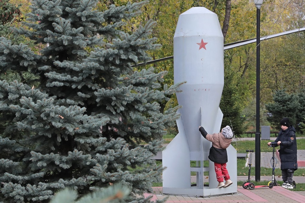 Children play at a monument dedicated to the first mass produced Soviet tactical nuclear bomb in Moscow, Russia. Photo: EPA-EFE