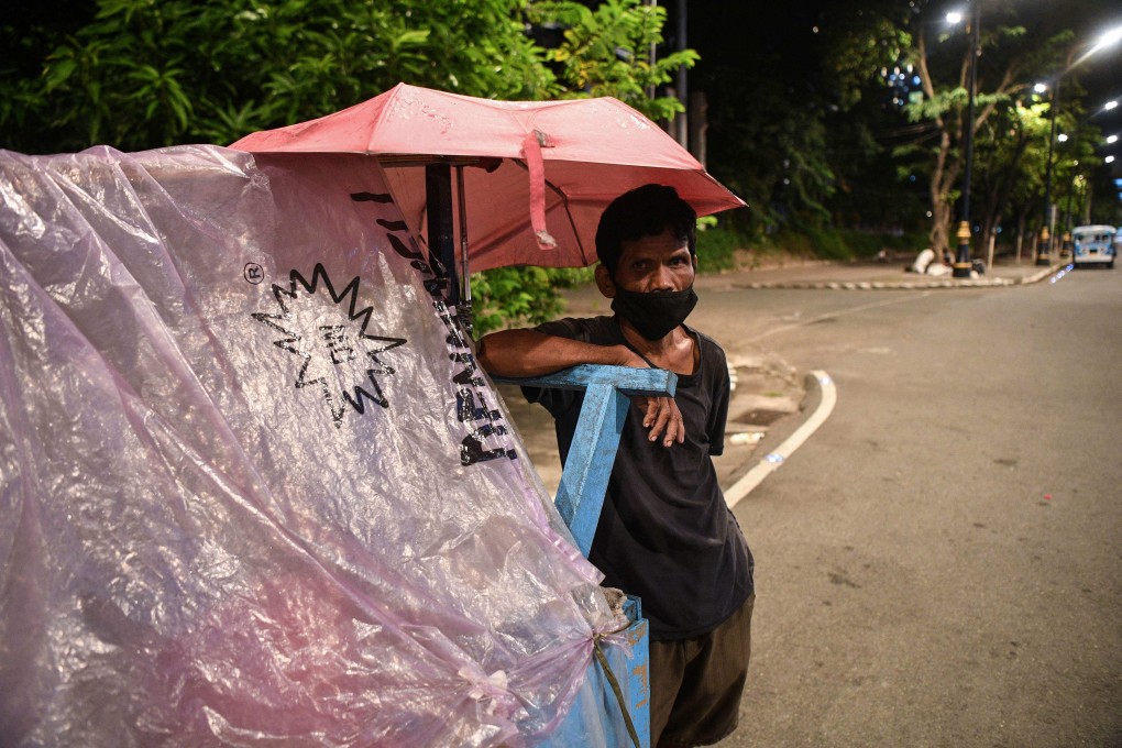 Pushcarts, known as karitons, are a common sight in the city of more than 13 million people. Often made from scraps of wood, the human-powered carts are used as shelter, storage and a source of income, such as collecting trash to sell to recyclers. Photo: AFP