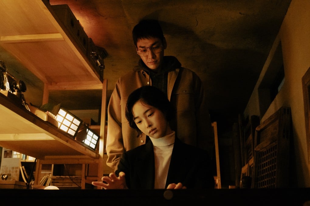 Kim Young-kwang as serial killer Yoon-oh and Kang Hae-lim as app developer Sum in a still from Korean drama series Somebody on Netflix.