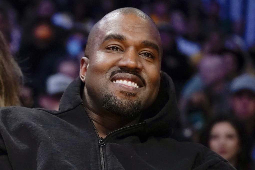 Kanye West watches an NBA game in Los Angeles in March. Photo: AP