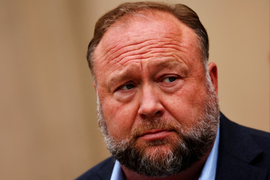 Infowars founder Alex Jones speaks to the media after appearing at his Sandy Hook defamation trial in Waterbury, Connecticut, in October. Photo: Reuters