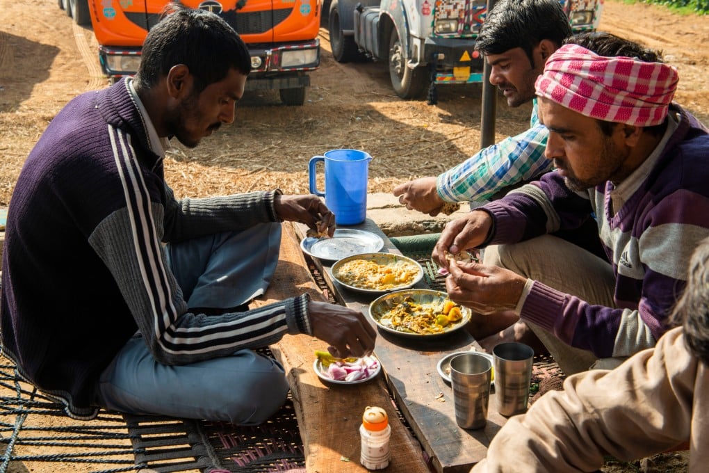 Truckers eat a meal at a typical dhaba roadside cafe in Rajasthan, India. The dhaba’s popularity has inspired restaurants in high-end hotels in New Delhi and Hong Kong. Photo: Shutterstock