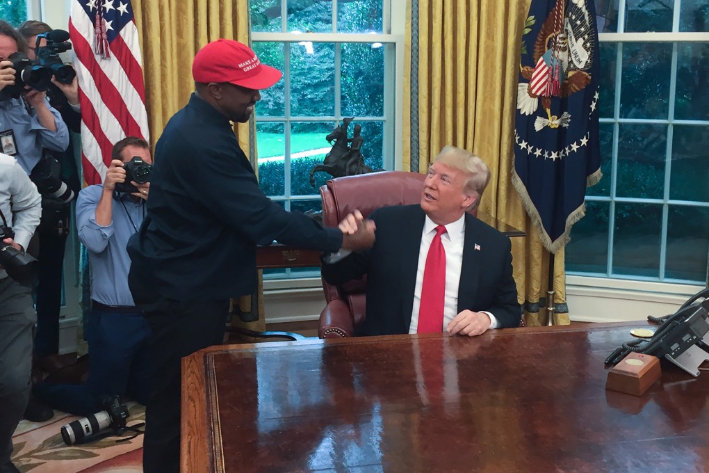 Former US President Donald Trump meets rapper Kanye West in the Oval Office of the White House in Washington in 2018. Photo: AFP via Getty Images / TNS