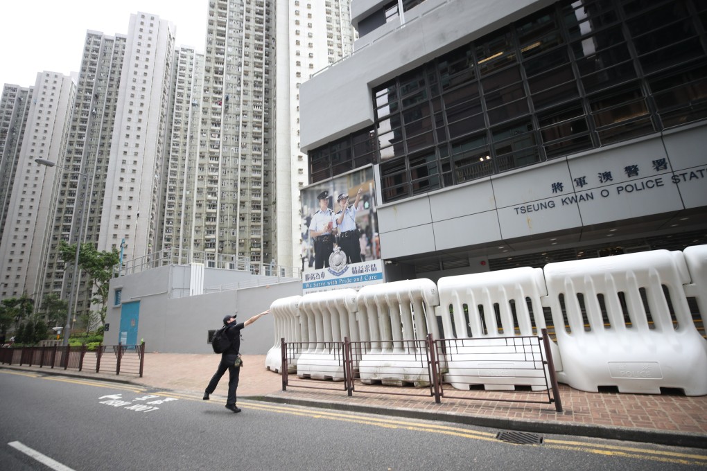 Anti-extradition bill protesters throw bricks outside Tseung Kwan O Police Station in 2019. Photo: Winson Wong
