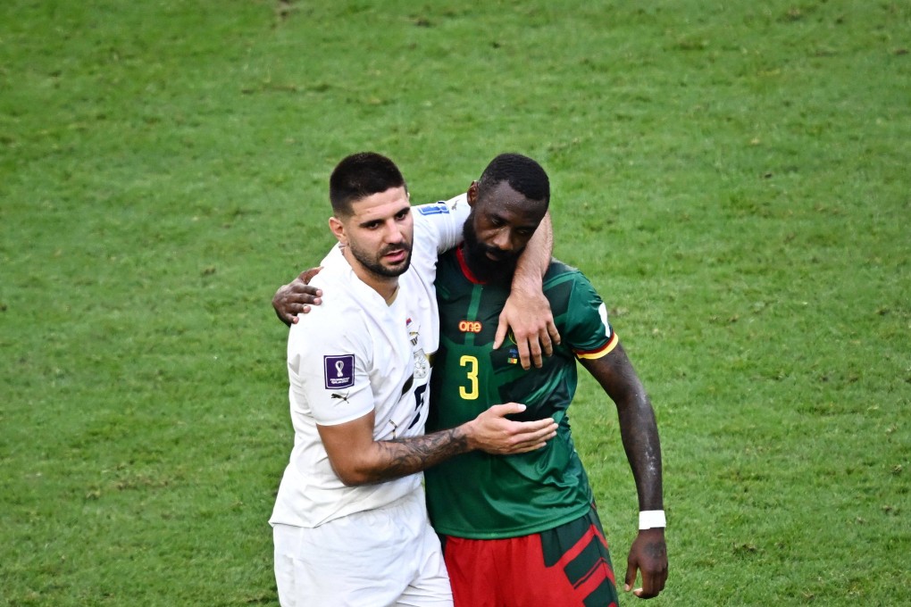 Cameroon’s defender Nicolas Nkoulou hugs Serbia’s forward Aleksandar Mitrovic at the end of a World Cup Group G match at the Al-Janoub Stadium in Al-Wakrah, south of Doha, on November 28. Photo: AFP