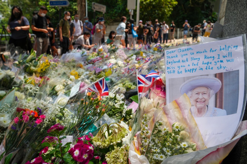 People queue to leave tributes to Queen Elizabeth outside the British consulate in Hong Kong. The outpouring of sympathy sparked calls to decolonise the city’s laws. Photo: Sam Tsang