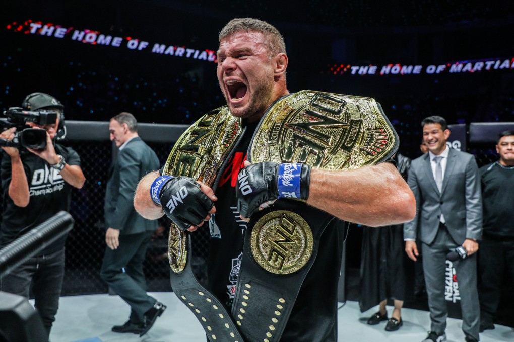 Anatoly Malykhin celebrates after becoming the light heavyweight champion. Photos: ONE Championship