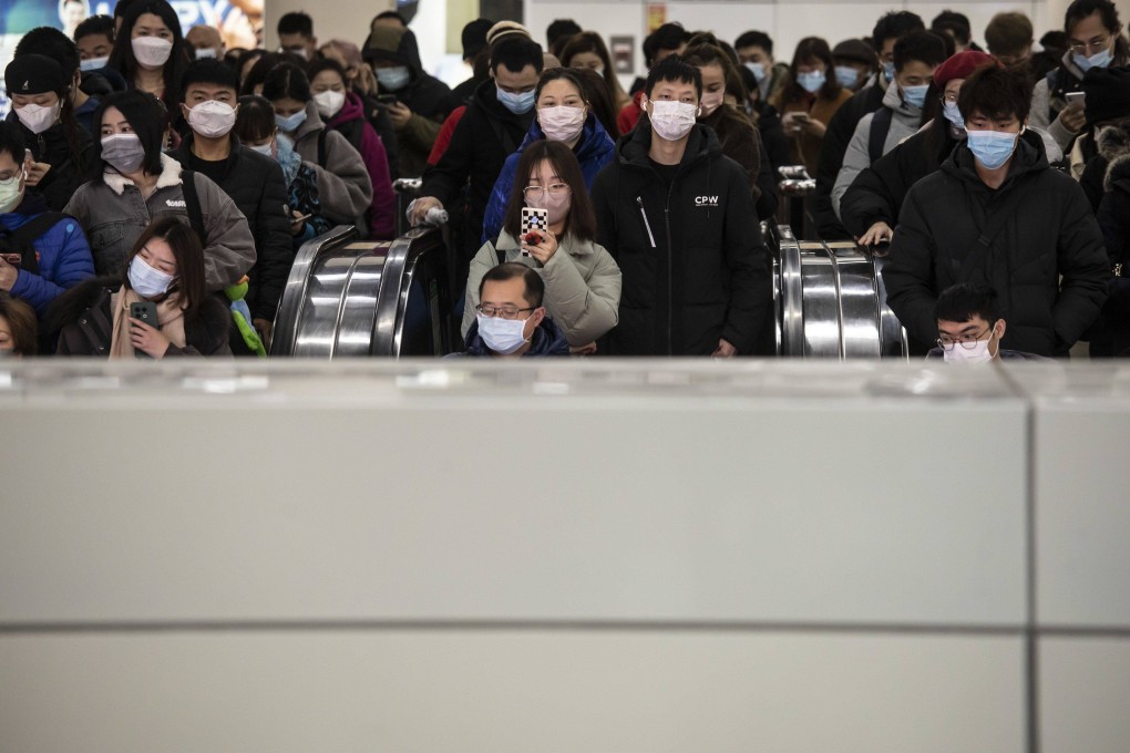 Morning commuters enter a subway station in Shanghai on December 5, 2022. Government officials over the past week signaled a transition away from the harshest Covid containment measures, which have weighed on the economy and prompted thousands of demonstrators to take to the streets to voice their anger. Photo: Bloomberg