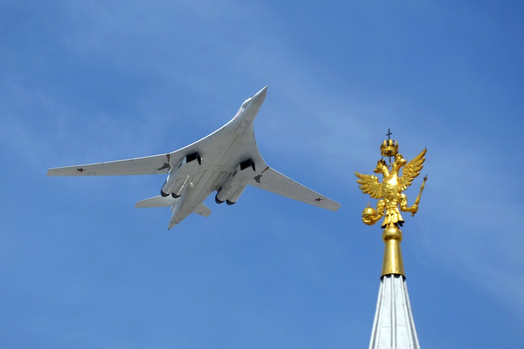 A Russian bomber flies over Moscow’s Red Square during a military parade in 2015. Photo: AFP