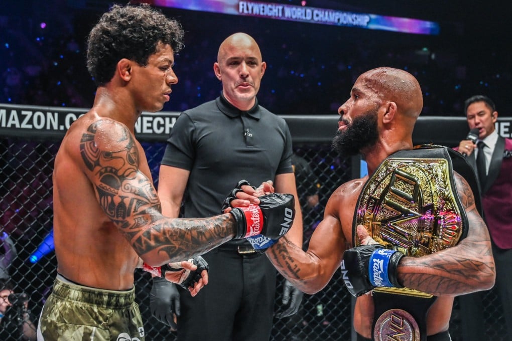 Adriano Moraes (left) congratulates Demetrious Johnson in Singapore. Photos: ONE Championship