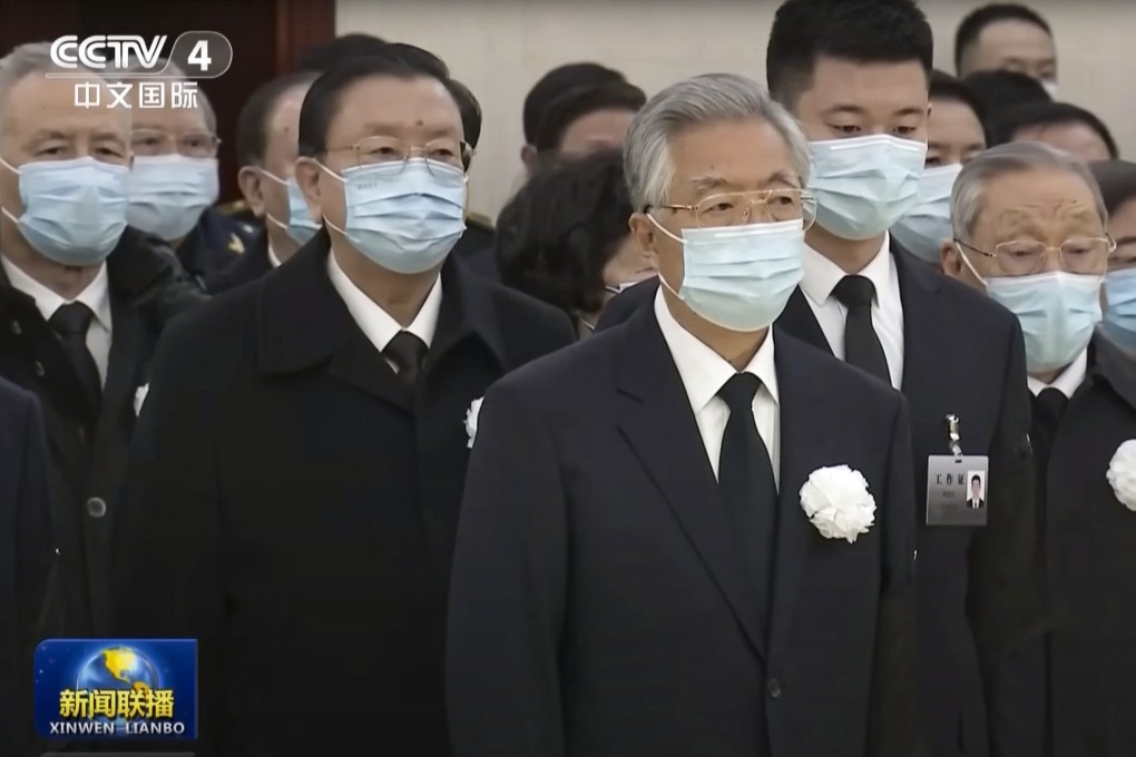 Hu Jintao bids farewell to Jiang Zemin in Beijing on Monday. Photo: CCTV