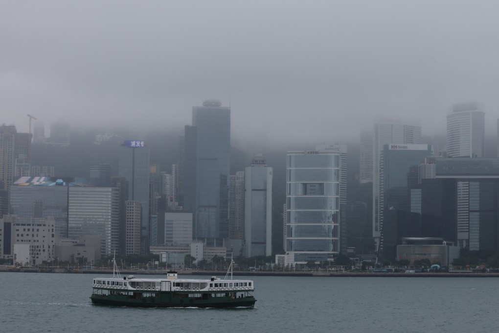 The Star Ferry sails down Victoria Harbour on a foggy day on November 25. Photo: Edmond So