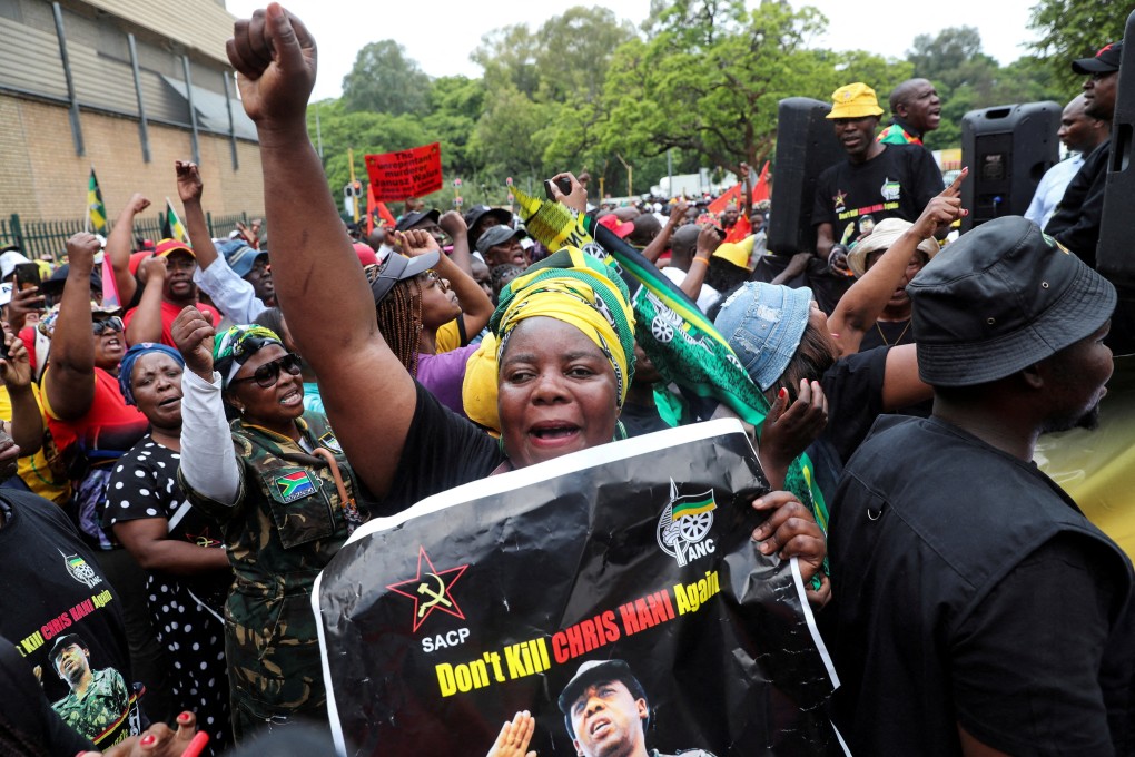 Protesters demonstrate against the parole of Janusz Walus who murdered anti-apartheid leader Chris Hani in 1993. Photo: Reuters