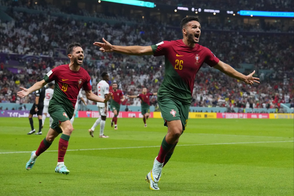 Portugal’s Goncalo Ramos (right) celebrates after scoring during the World Cup round of 16 soccer match between Portugal and Switzerland in Qatar on Tuesday. Photo: AP