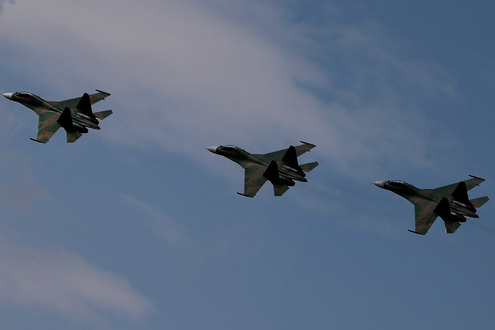 Vietnam People’s Air Force’s Su-30MK2 fighter planes undertake drills in Hanoi, Vietnam. Photo: EPA-EFE/File
