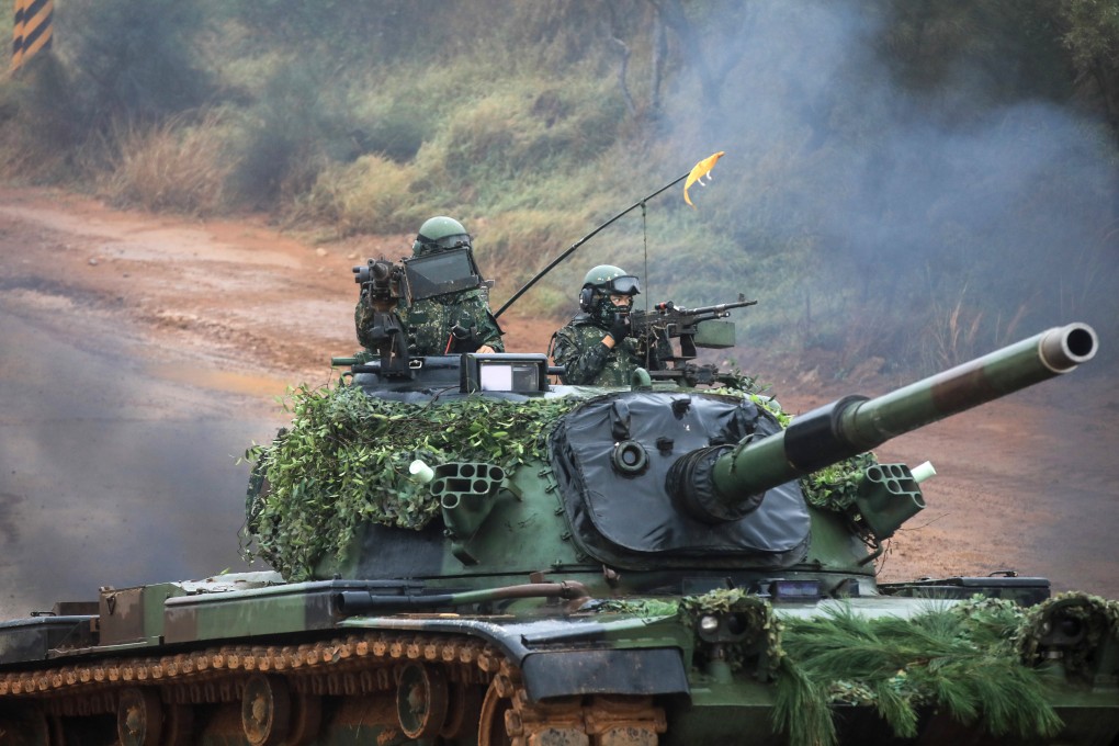 Taiwan Armed Forces soldiers crew a battle tank during a military combat live-fire exercise in Hsinchu, Taiwan. The US Congress is considering legislation that will help Taiwan pay for arms sales from US suppliers. Photo: Bloomberg