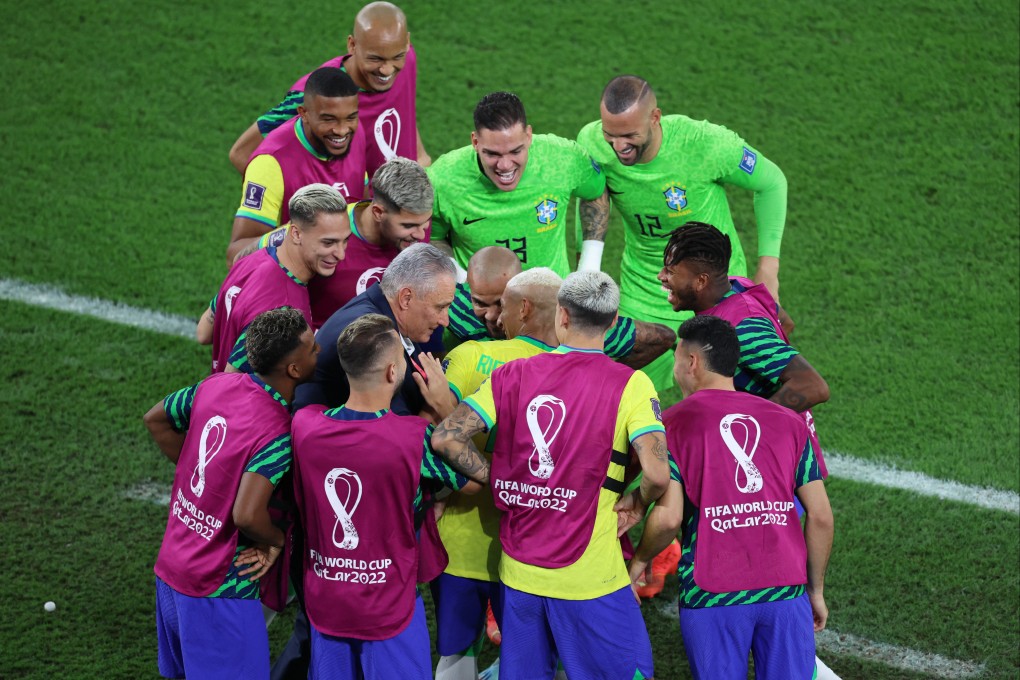 Brazil’s Richarlison celebrates scoring against South Korea by dancing with coach Tite and teammates. Photo: Reuters