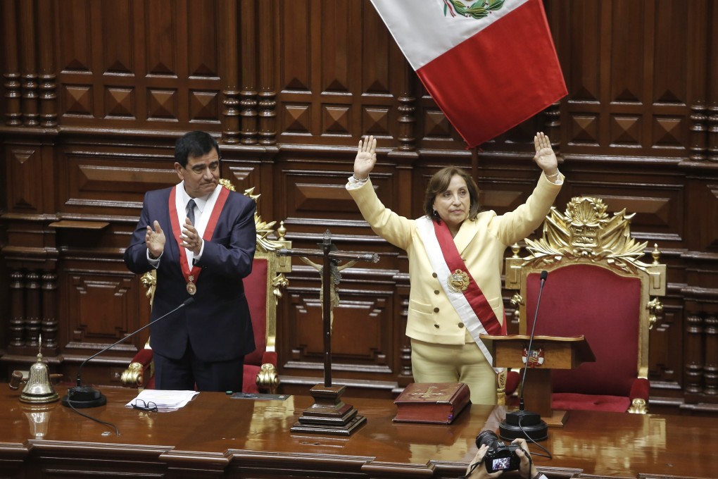 Dina Boluarte gestures after being sworn in as Peru’s new president in Lima on Wednesday. Photo: EPA-EFE
