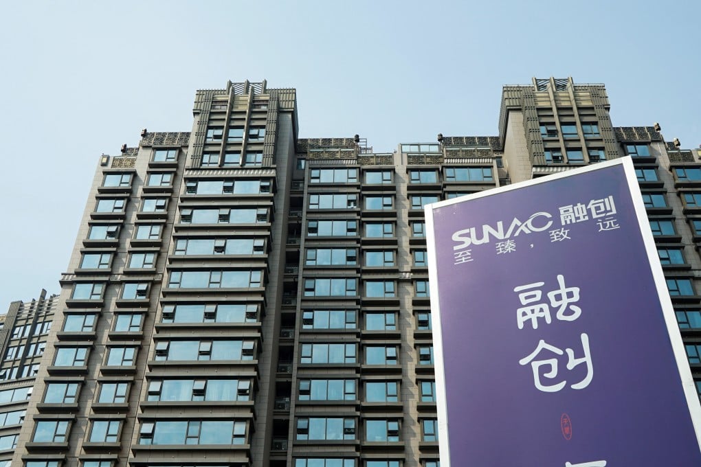An advertisement for property developer Sunac China Holdings is seen at a residential complex in Shanghai in March 2018. Photo: Reuters