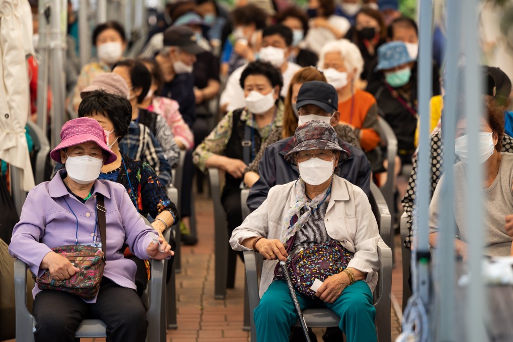 Elderly South Koreans waiting to receive a Covid-19 vaccination in 2021. The country is changing how it calculates ages, meaning citizens will become younger, on paper.  Photo: Bloomberg