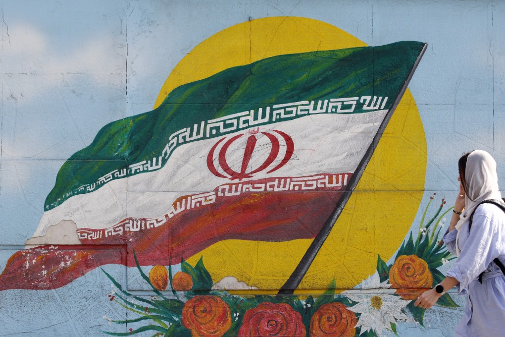 Graffiti showing the national flag in Iran, which has just hanged an anti-government protester. Photo: EPA-EFE
