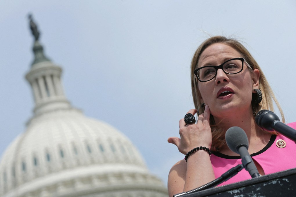 US lawmaker Kyrsten Sinema speaks at a news conference outside the Capitol in May 2014. Photo: AFP