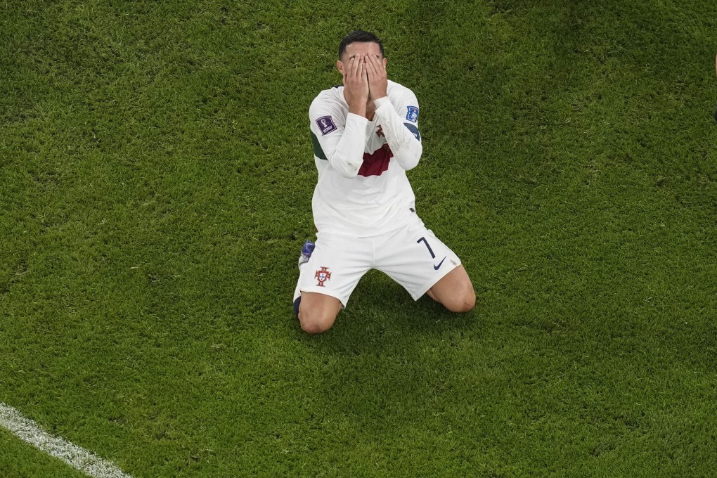 Cristiano Ronaldo reacts after watching a shot miss the target. Photo: AP