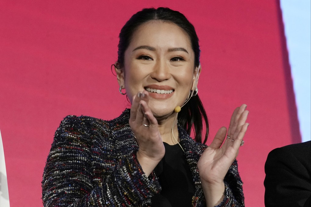Paetongtarn Shinawatra, the daughter of former Thai Prime Minister Thaksin Shinawatra, applauds after a Pheu Thai Party general assembly meeting in Bangkok earlier this month. Photo: AP