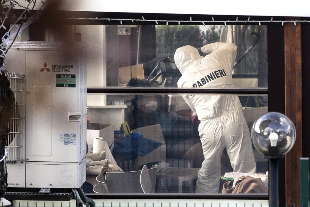 Police at the scene where three people were killed in a shooting in Rome. Photo: EPA-EFE