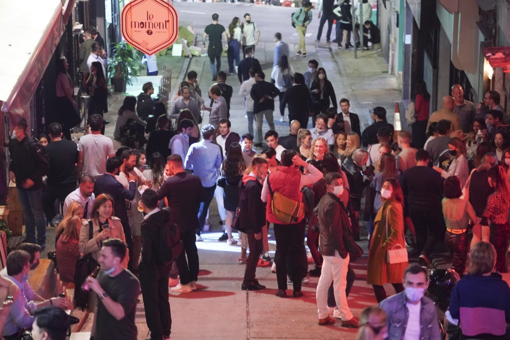 People drinking in Soho during the fourth wave of the pandemic on February 19, 2021. Decreased motivation to comply with social measures during the fourth wave was attributed to months of relentless pandemic vigilance, something greater use of the social sciences could have helped prevent. Photo: Felix Wong