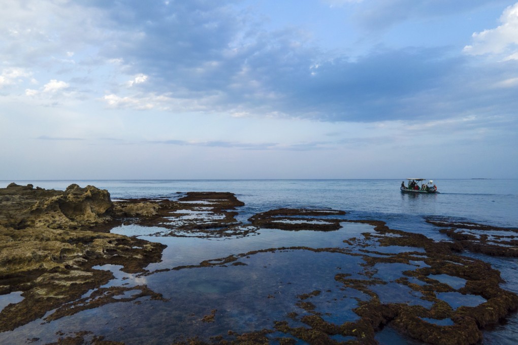 A boat, with marine protected areas officials, moves in the Mediterranean Sea marine natural reserve of Rosh Hanikra in northern Israel on October 26. Half of world GDP is generated by sectors – from agriculture and lumber to fisheries – that are moderately or highly dependent on ecosystems. These vital natural assets shouldn’t be compromised. Photo: AP