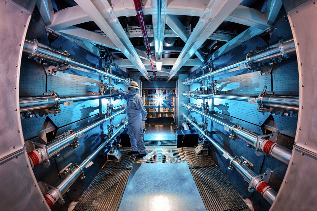 A technician reviews an optic inside the preamplifier support structure at the Lawrence Livermore National Laboratory in California, the site of a major scientific breakthrough. File photo: via AP