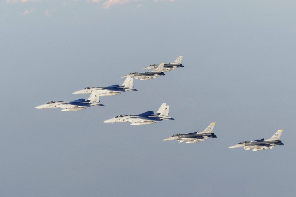 Jets from the air forces of Japan and the US fly in formation during a bilateral exercise over the Sea of Japan in November. Photo: Japan’s Defence Ministry via AFP