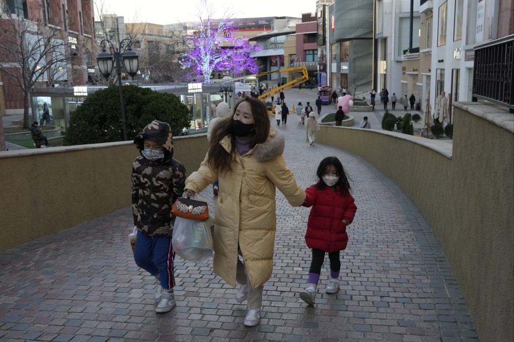 Shoppers return to a mall as restrictions are eased and shops reopen in Beijing earlier this month. Photo: AP Photo