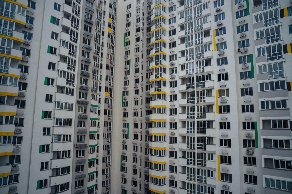 This picture shows residential building in Kyiv on December 9, 2022 as the loss of regular access to elevators due to power cuts caused by Russian attacks on Ukraine’s electrical grid has only brought more hardship. - Maintenance crews work around the clock to rescue people stranded in stuck elevators across Kyiv, where residents can linger for hours in the cold and dark waiting for reprieve. (Photo by Dimitar DILKOFF / AFP)