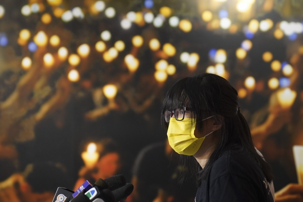 Hong Kong Alliance in Support of Patriotic Democratic Movements of China’s vice-chairwoman Chow Hang-tung (yellow mask) at a press conference at the group’s office at Ngai Wong Commercial Building, Mong Kok, last year. Photo: Sam Tsang