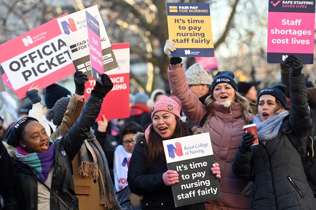 NHS nurses picket outside StThomas’ Hospital in London. Photo: EPA-EFE
