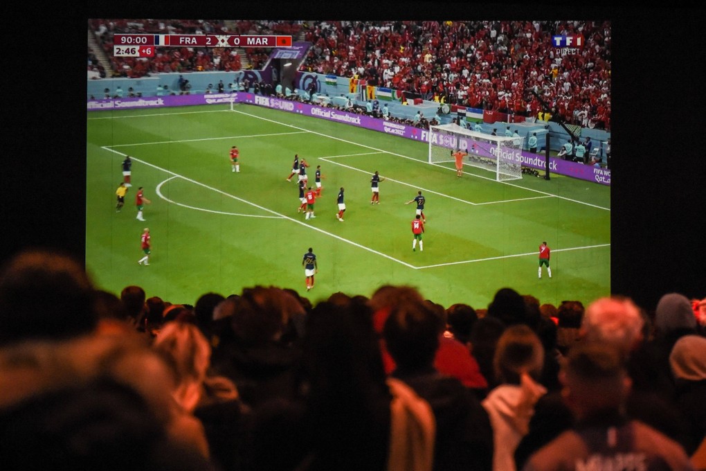 Football fans in Saint-Nazaire in western France watch the World Cup semi-final match between France and Morocco on December 14. Photo: AFP