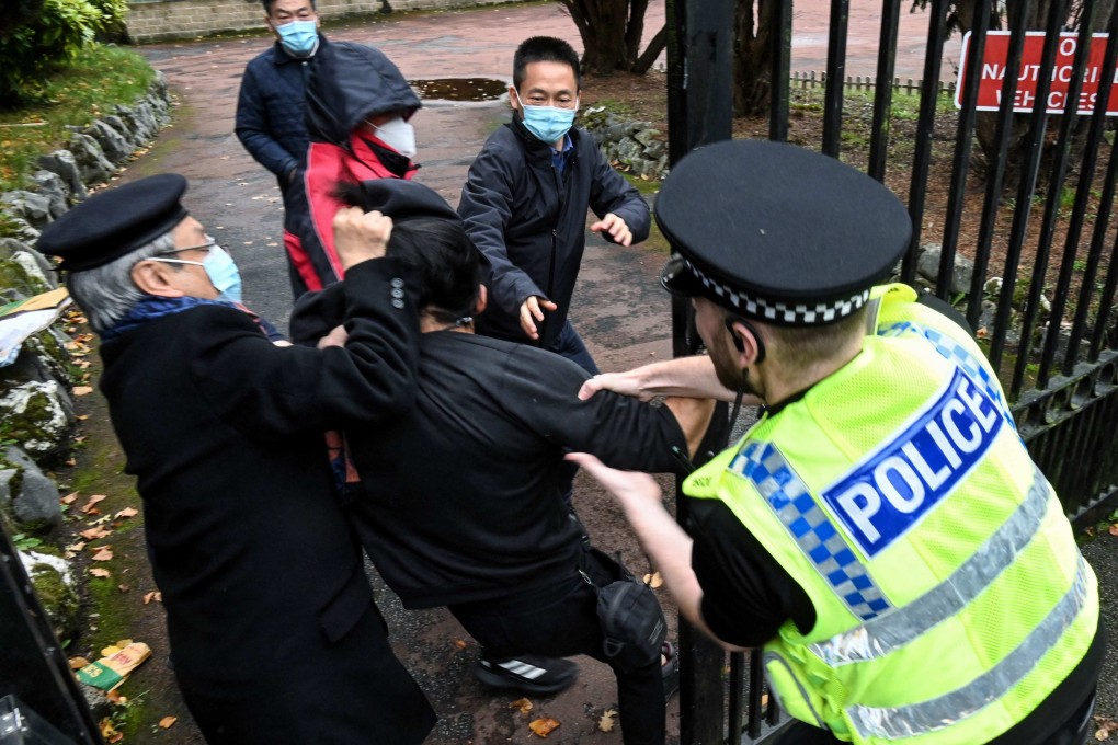 An incident involving a scuffle between a pro-democracy protester (centre) and Chinese consulate staff in Manchester, UK, as a British police officer attempts to intervene, during a demonstration in October. Photo: The Chaser News via AFP