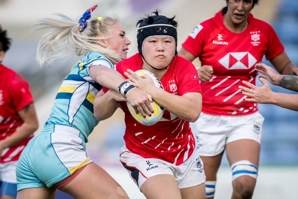 Hong Kong co-captain Lee Ka-shun bursts through a tackle during the first Test against Kazakhstan. Photo: Ike Images