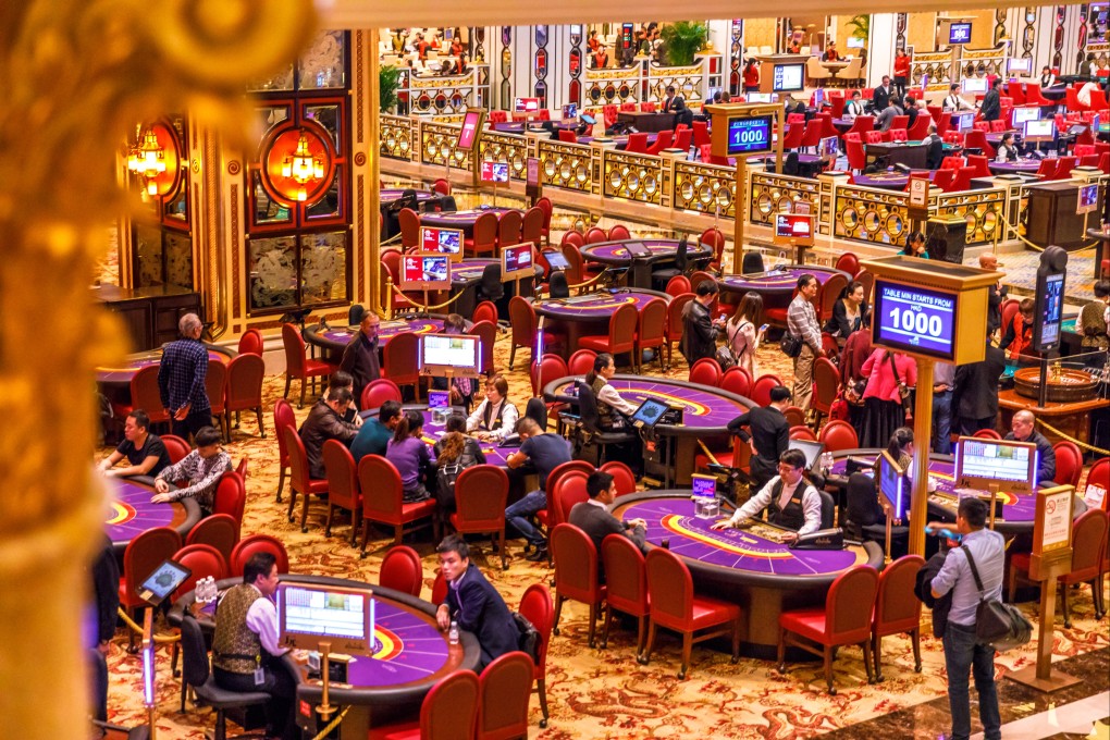 Aerial view of blackjack tables and gamblers inside The Venetian Casino in Macau. Photo: Shutterstock