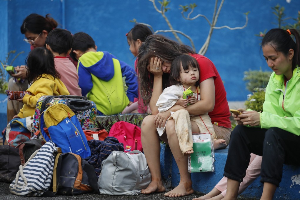 Survivors of a landslide that hit a campsite in Selangor, Malaysia. Photo: EPA-EFE