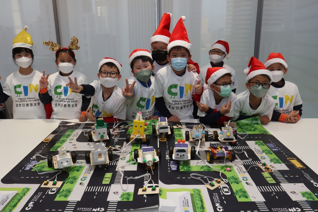 Young students taking part in the electric vehicle model workshop. Photo: Edmond So