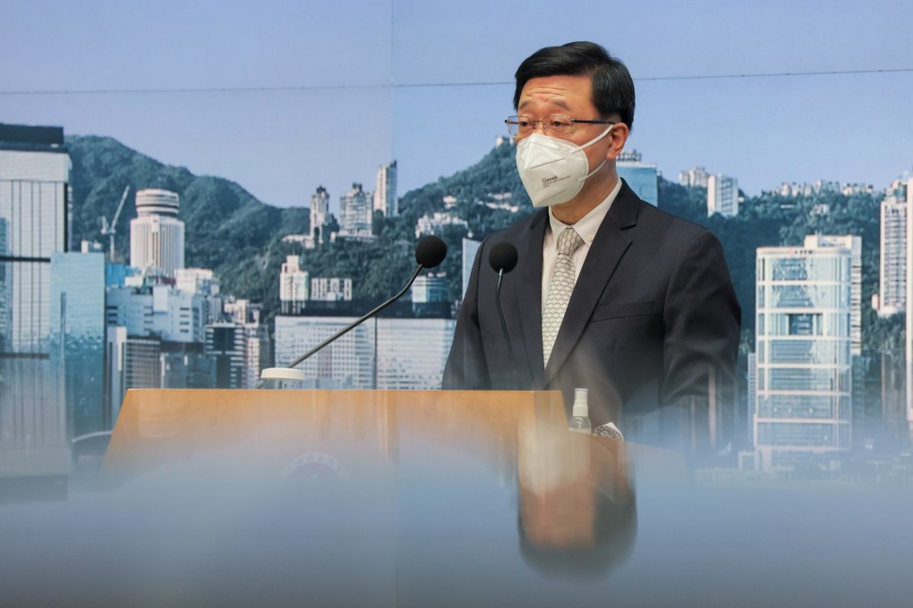 Chief Executive John Lee Ka-chiu announces the further easing of Covid-19 restrictions during a press conference at the Hong Kong government offices on December 13. Photo: Jelly Tse