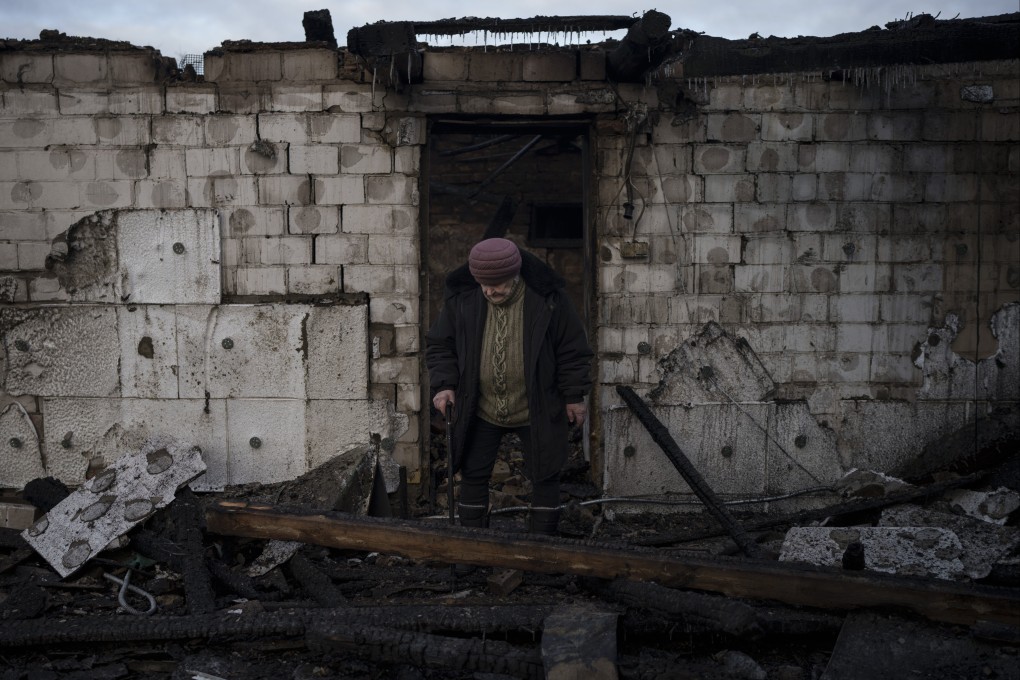 Olha Kobzarenko searches for her dog after a Russian drone attack in the village of Stari Bezradychi, Kyiv region, Ukraine. Photo: AP