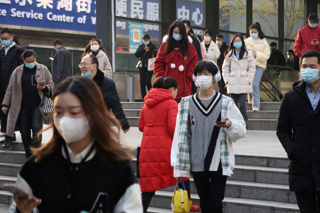 Morning rush hour outside an underground station in Wuhan, in
China’s central Hubei province, following the easing of Covid-19 restrictions nationwide. Photo: Reuters