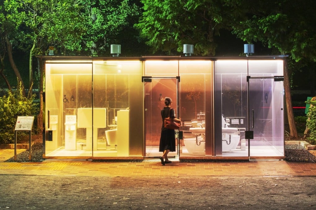 Public restrooms with transparent walls in Yoyogi Fukamachi Mini Park by Shigeru Ban. Photo: Nippon Foundation