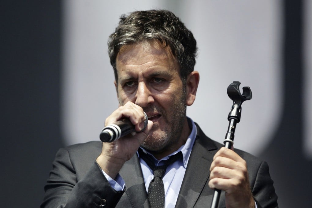 Musician Terry Hall of The Specials, performing in 2014. Hall has died at the age of 63 following a brief illness. Photo: via AP